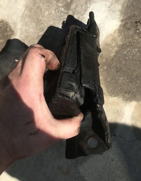 1995 Ford Bronco - This engine mount is clearly broken and needs replacement.