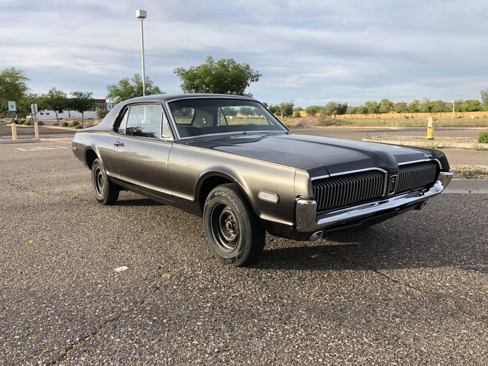 1968 Mercury Cougar parked on asphalt lot, front 3/4 view