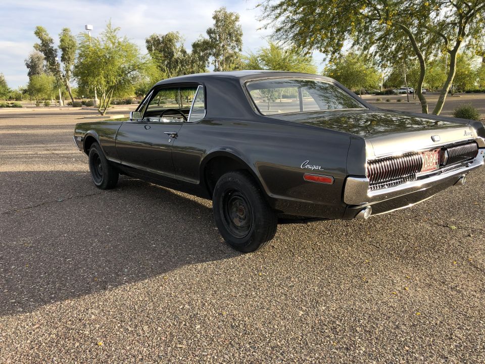 1968 Mercury Cougar coupe, rear 3/4 view, dark gray