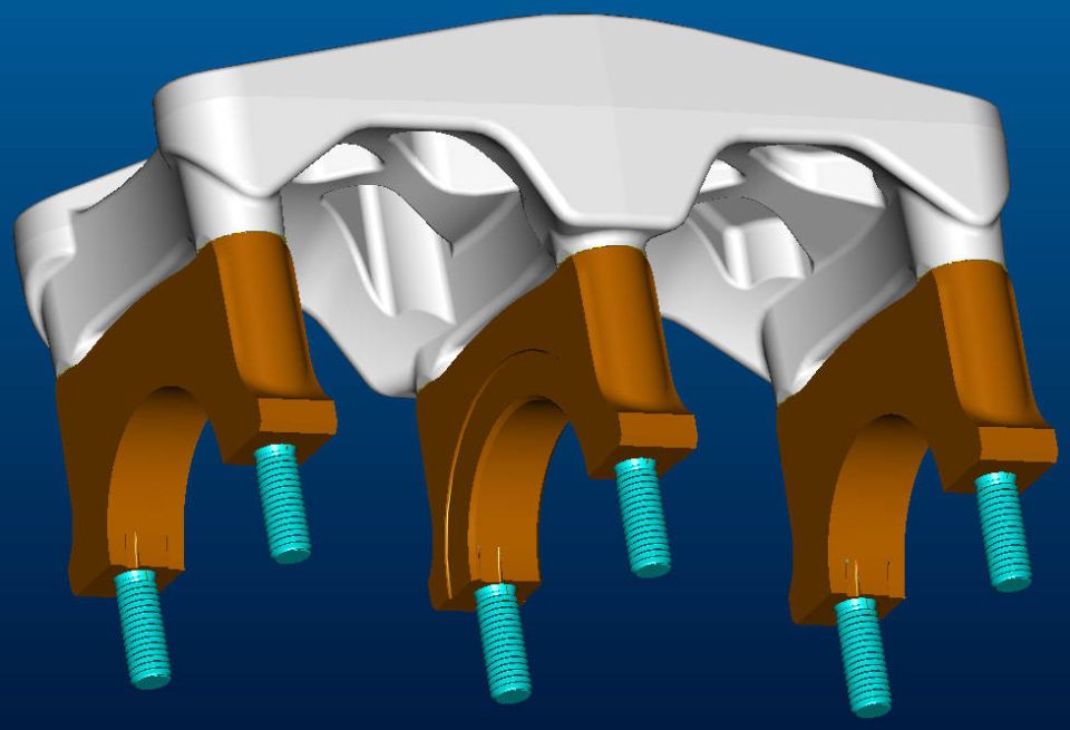 CAD render of engine main bearing caps with studs on block saddles