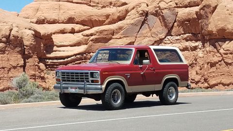1985 Ford Bronco - This classic Ford Bronco is captured in a scenic desert landscape, its iconic design.