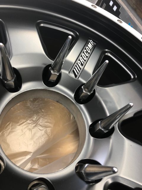 1992 Jeep Wrangler - A Pro Comp wheel is shown with spike-shaped lug nuts and a silver finish.