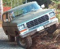 1979 Ford Bronco - This 1978-1979 Ford Bronco is shown in a three-quarter front view while navigating a dirt road.
