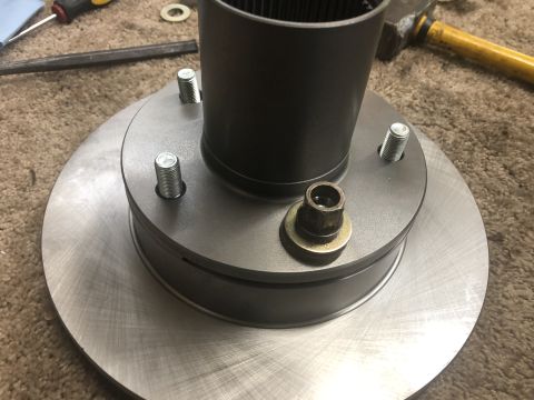 1995 Ford Bronco - Easy way to install wheel studs and press the rotor onto the hub. Open end lug nut, some washers and an impact.