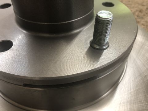 1995 Ford Bronco - Keep going until you see the shoulder of the wheel stud pulling into the hub. There should be NO play between hub and rotor. It's a press f…