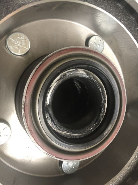 1995 Ford Bronco - Packed the inner wheel bearing with grease (a bearing packer makes this REALLY quick and easy and it MAKES SURE you get plenty of grease in…