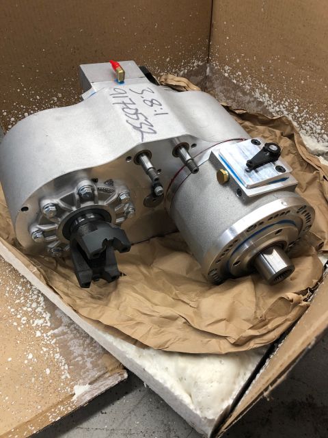 1992 Jeep Wrangler - This aluminum transfer case, marked with a 3.8:1 ratio and serial number 9170532, is shown packed in brown paper.