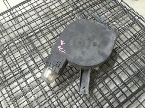 1994 Ford Bronco - Automotive part with handwritten markings, placed on a wire rack.