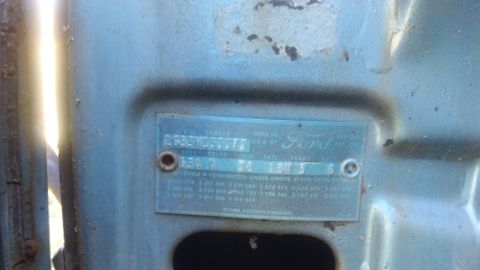 1961 Ford Starliner - A close-up of a 1961 Ford VIN plate, confirming the model year and vehicle identification.