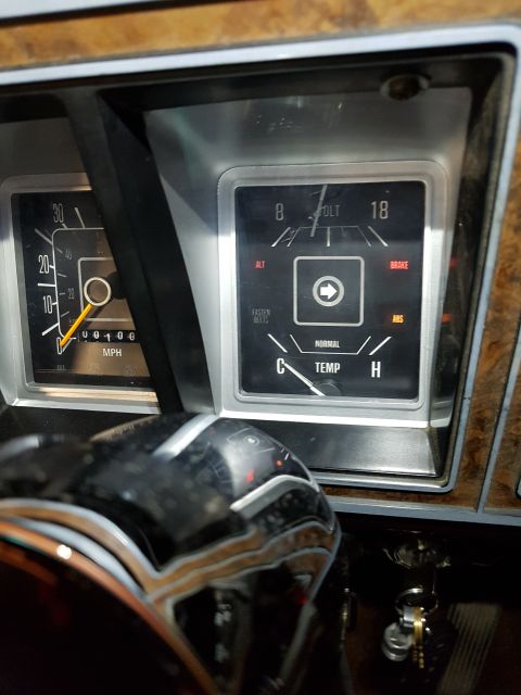 1978 Ford Bronco - Dashboard gauges including speedometer and a multi-function gauge for voltage, temperature, and warning lights.