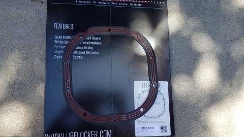 1985 Ford Bronco - A LubeLocker differential gasket is shown on its packaging, detailing its features and installation benefits.