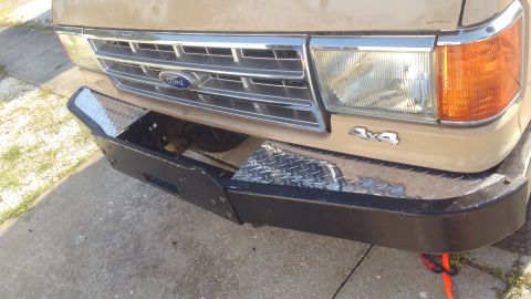 1990 Ford F-250 - got the bumper hammered as straight as i can and mounted better. decided to put a sheet of diamond plate on the top. makes it look much bet…