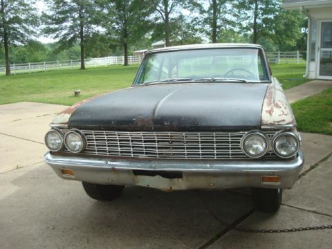 1962 Ford Galaxie - Front view of a 1962 Ford Galaxie with a distinctive grille and dual headlights.