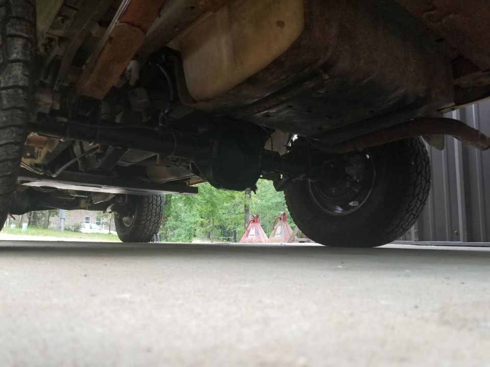 The leaf spring & sway bar U-bolts were the last things to go on.  The driveshaft angle looks good, but I haven't measured it yet.  I reverse-bled the brakes 2x, and I might do it again after the first drive.  The last thing to do is figure out the e-brake situation...

The van hose (F2UZ-2282-A) fit the Bronco frame & brake line, and the Bronco sway bar fit the van axle.