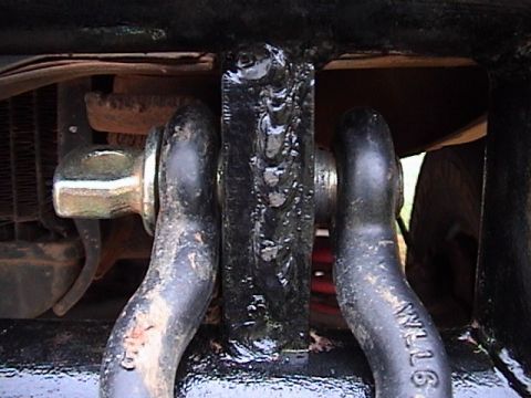 1978 Ford Bronco - Close-up of a welded bracket and tow hooks, with a Supermotors.net watermark.