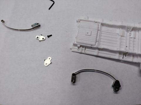 1995 Ford Bronco - Leaf assembly in progress. The leaf solid mounts to the frame with the bracket on the right. The shackle on the left also mounts directly t…