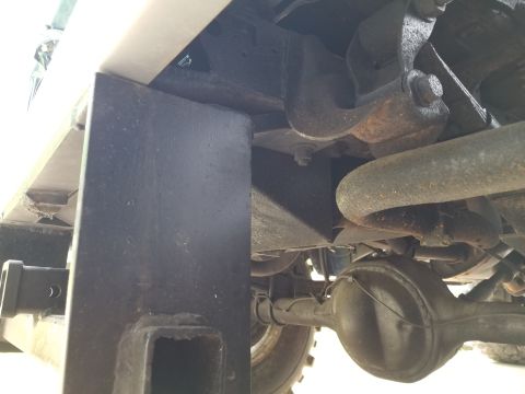 1974 Ford Bronco - One rusty bolt in each frame rail is all that's holding the rear receiver on. There\\'s a hole close to the lower bumper bolt hole, but no…