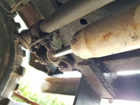 1974 Ford Bronco - The steering damper has been gouged by its own U-bolts on the drag link. The front receiver is welded to the frame. [url=https://www.superm…