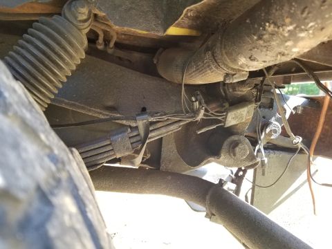 1974 Ford Bronco - It's amazing that any of the taillights work. One rusty bolt in each frame rail is all that's holding the rear receiver on. There's a hole…