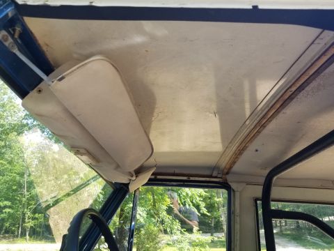1974 Ford Bronco - The front headliner is missing, and the rear is sagging badly. The wiper linkage isn't installed correctly inside, and the wiper cover isn'…