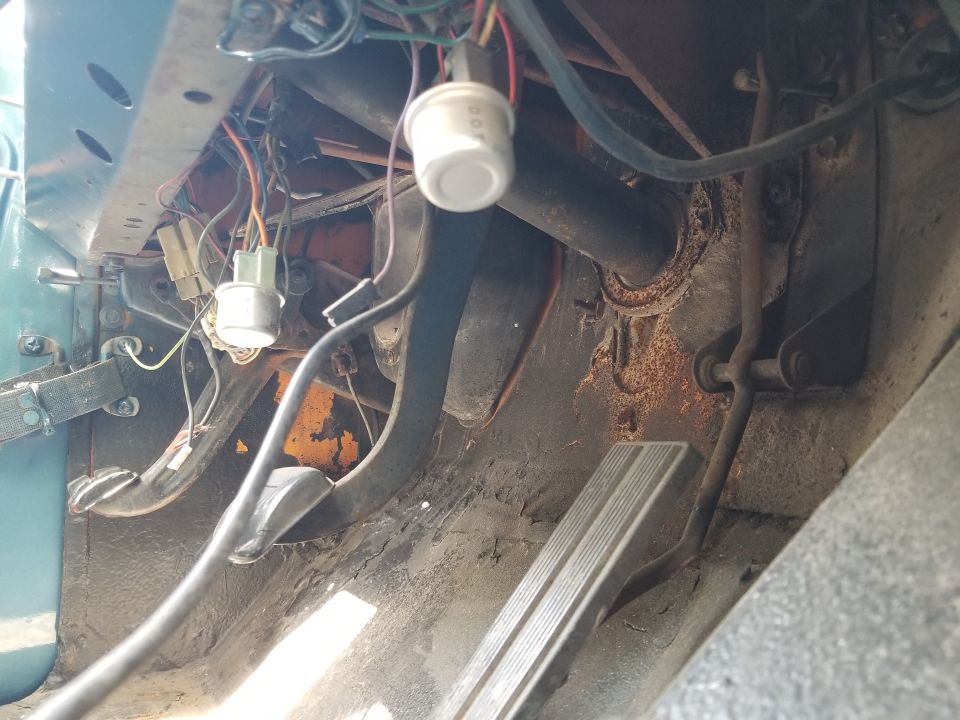I think at least one of the door limit strap bars needs to be turned around so the door doesn't swing as far.  We haven't attempted to apply the e-brake yet.

UPDATE: the brakes have been fully repaired.