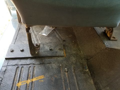 1974 Ford Bronco - The passenger seat has been re-mounted on this heavy plate.