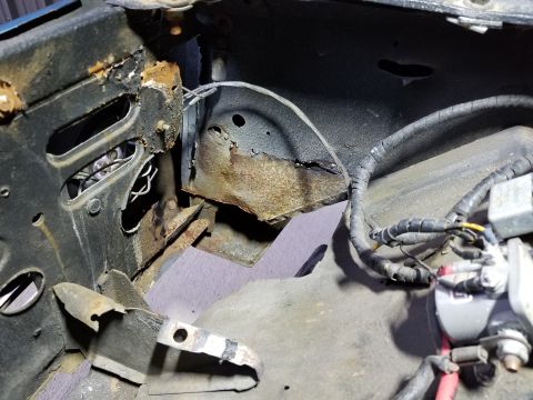 1974 Ford Bronco - The main brace between the wheelwell & core support is so badly corroded that it has been curling down, under the weight of the oversize ba…