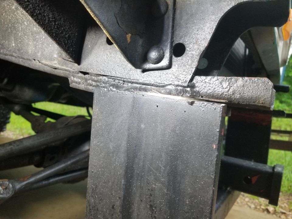 The front receiver was a nightmare...  These side plates are at least 3/8" thick, which is ridiculously overkill for a truck frame close to 1/4 that thickness.  And I don't know why they couldn't have bolted this one on, too.  I had to trace the frame contour with a cutting wheel for quite a while.