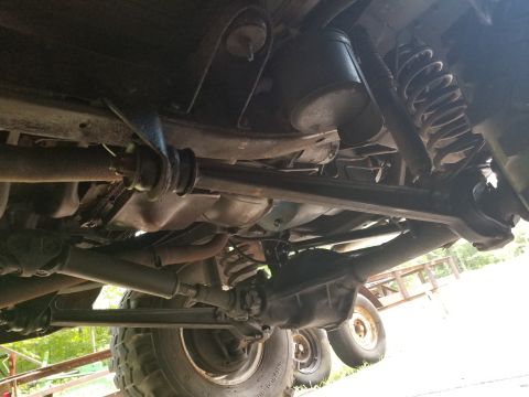 1974 Ford Bronco - The front axle is now held in its correct position, so the truck can be aligned, and new tires can go on. I applied Rust-Oleum Rubberized U…