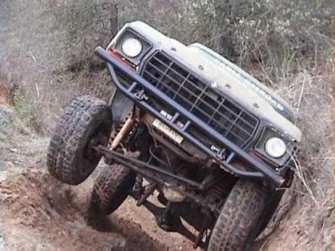 1978 Ford Bronco - This 1978 Ford Bronco navigates a steep, muddy incline during an off-road excursion.