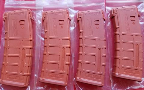 2000 Ford Crown Victoria - Four tan PMAG 30 rifle magazines are shown packaged together.