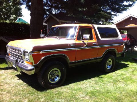 1978 Ford Bronco - This 1978 Ford Bronco features a distinctive two-tone paint scheme and is parked outdoors.
