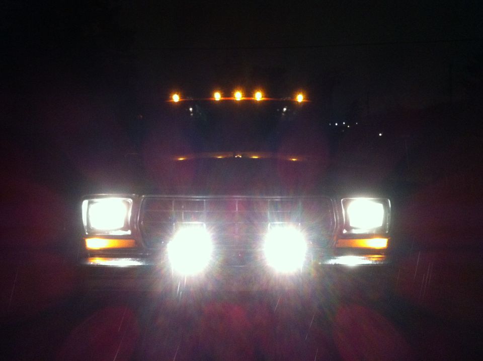 1978 Ford Bronco front with headlights and marker lights illuminated