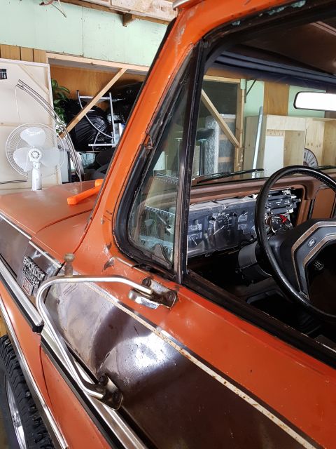 1978 Ford Bronco - Interior view of a 1978 Ford Bronco, focusing on the dashboard and driver's side.