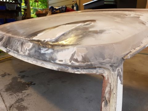 1978 Ford Bronco - This vehicle roof panel is undergoing bodywork, showing areas of filler and sanding.