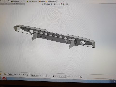1978 Ford Bronco - Screenshot of a 3D CAD model showing a tubular bumper with gusset supports, not a 2D technical document.