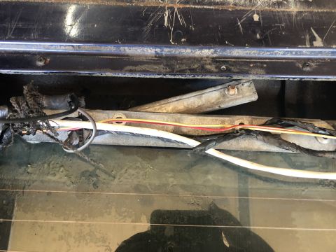 1995 Ford Bronco - Tailgate window mechanism and wiring harness detail.