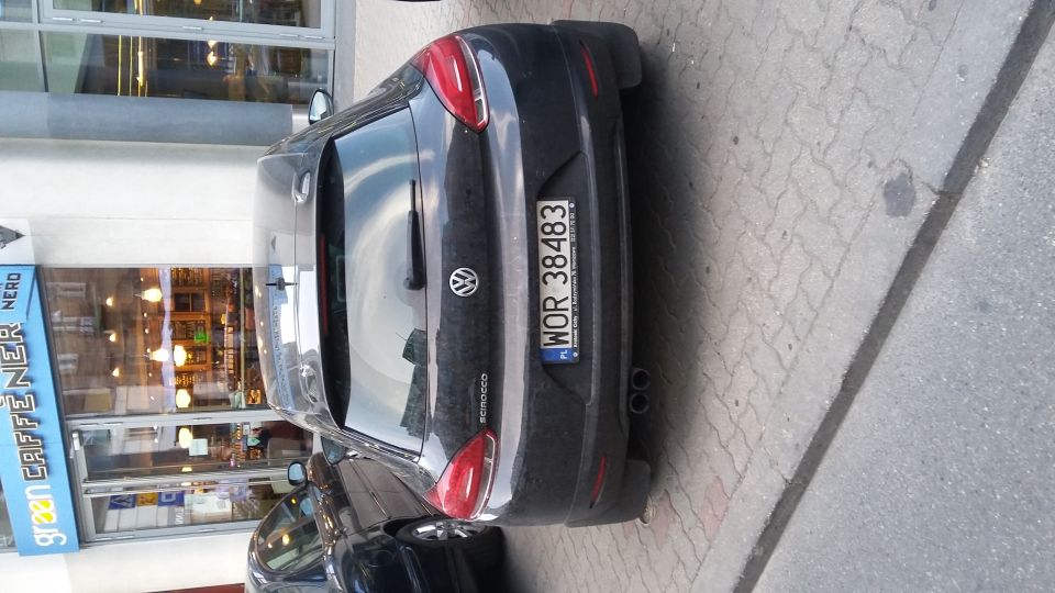 Dark gray Volkswagen Scirocco rear with license plate WOR 38483