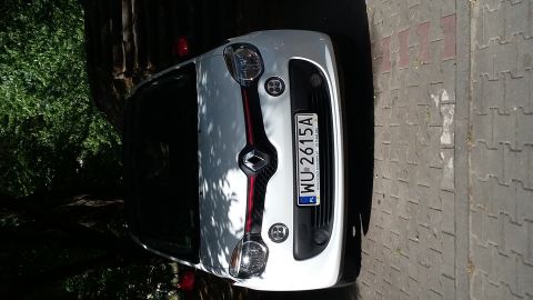 Rear view of white Renault Twingo with license plate WU-2615A