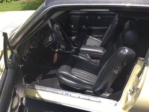 1968 Mercury Cougar - Interior view of a classic car, highlighting the front seats and dashboard details.