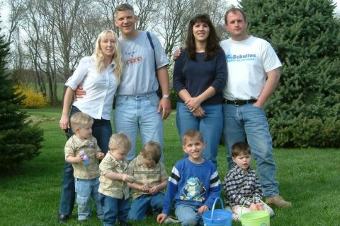 1996 Ford Bronco - Family photo taken outdoors with four adults and four children.