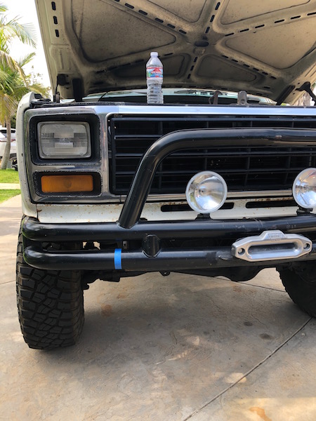 1981 Ford Bronco - This 1981 Ford Bronco features a prominent aftermarket bumper with a winch and auxiliary lights.
