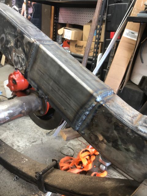1992 Jeep Wrangler - Close-up view of a welded frame section, showing a leaf spring and part of the differential.