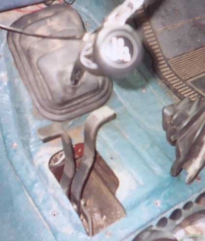 1987 Ford Bronco - this is the front output shifter and the rear output shifter. the 203 shifter sits above and to the right of these two