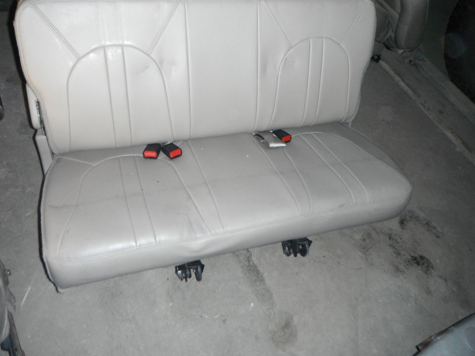 Car seat with seatbelts and mounting brackets