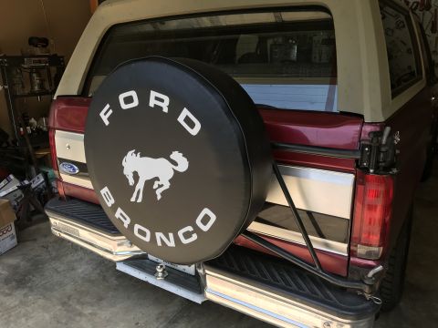 1994 Ford Bronco - The spare tire cover on this Ford Bronco features the iconic running horse logo and the vehicle's name.