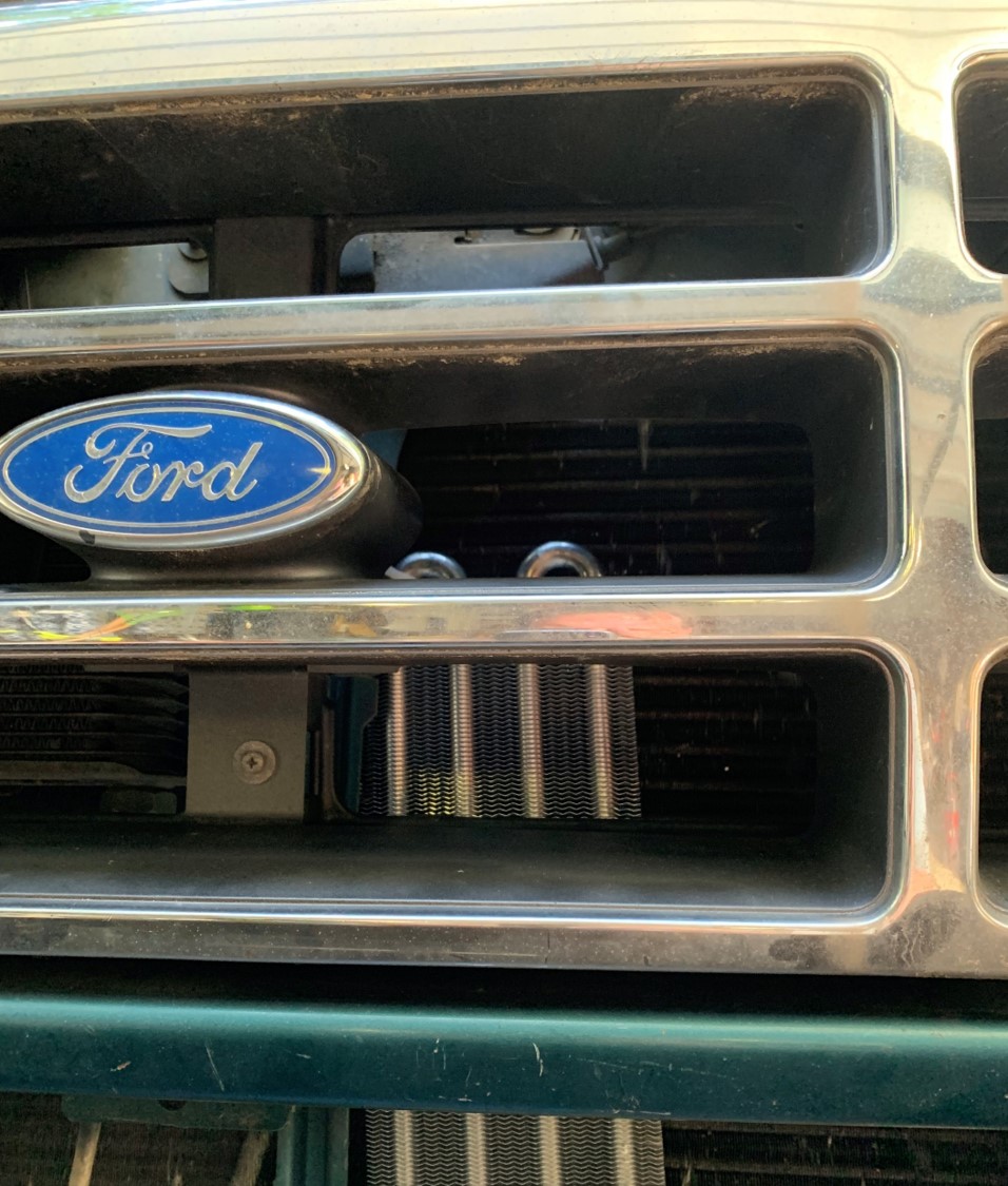 1996 Ford Bronco grille with Ford logo and visible radiator fins