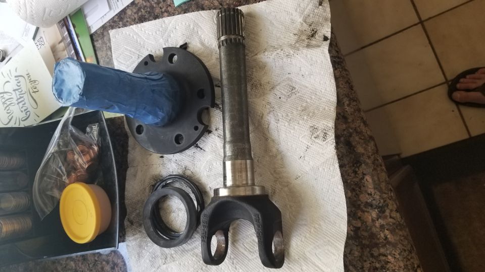 Axle shaft and hub assembly parts on a paper towel