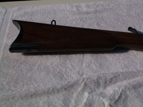 1995 Mercury Grand Marquis - The image shows the stock of a firearm, not a vehicle.