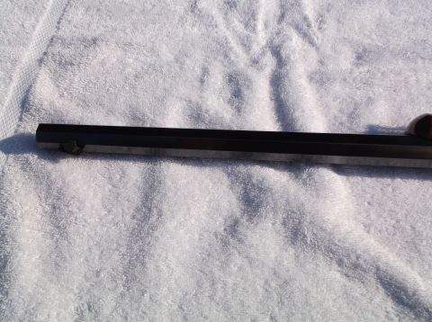 1995 Mercury Grand Marquis - A firearm barrel is shown on a white towel, with a SuperMotors watermark in the corner.